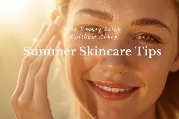 Woman with glowing summer skin applying sunscreen - Summer Skincare Tips, Seda Beauty Salon